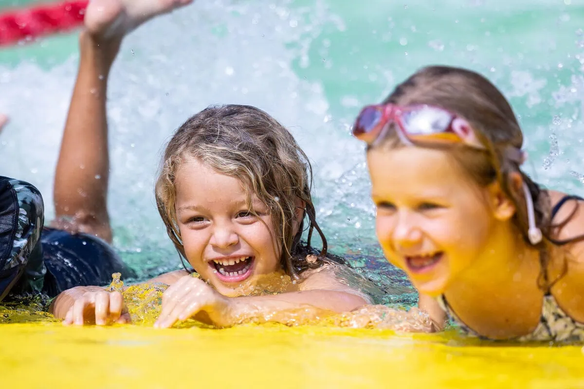 Children building water confidence during a swimming activity